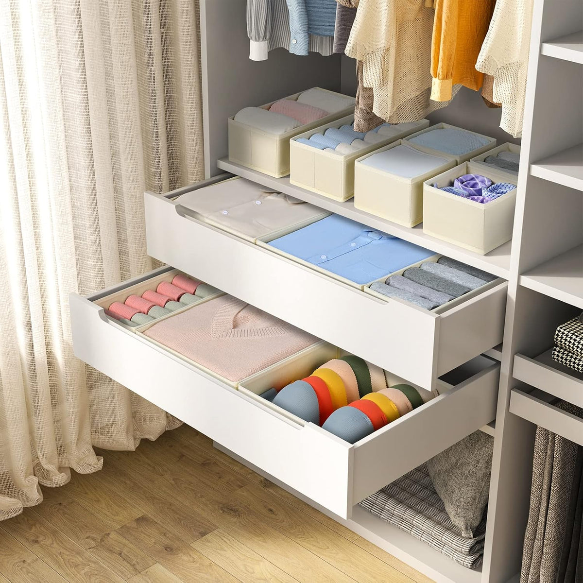Organizer set in a drawer organizing folded clothes
